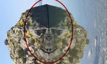 Göle yansıyan kayada şok eden figür